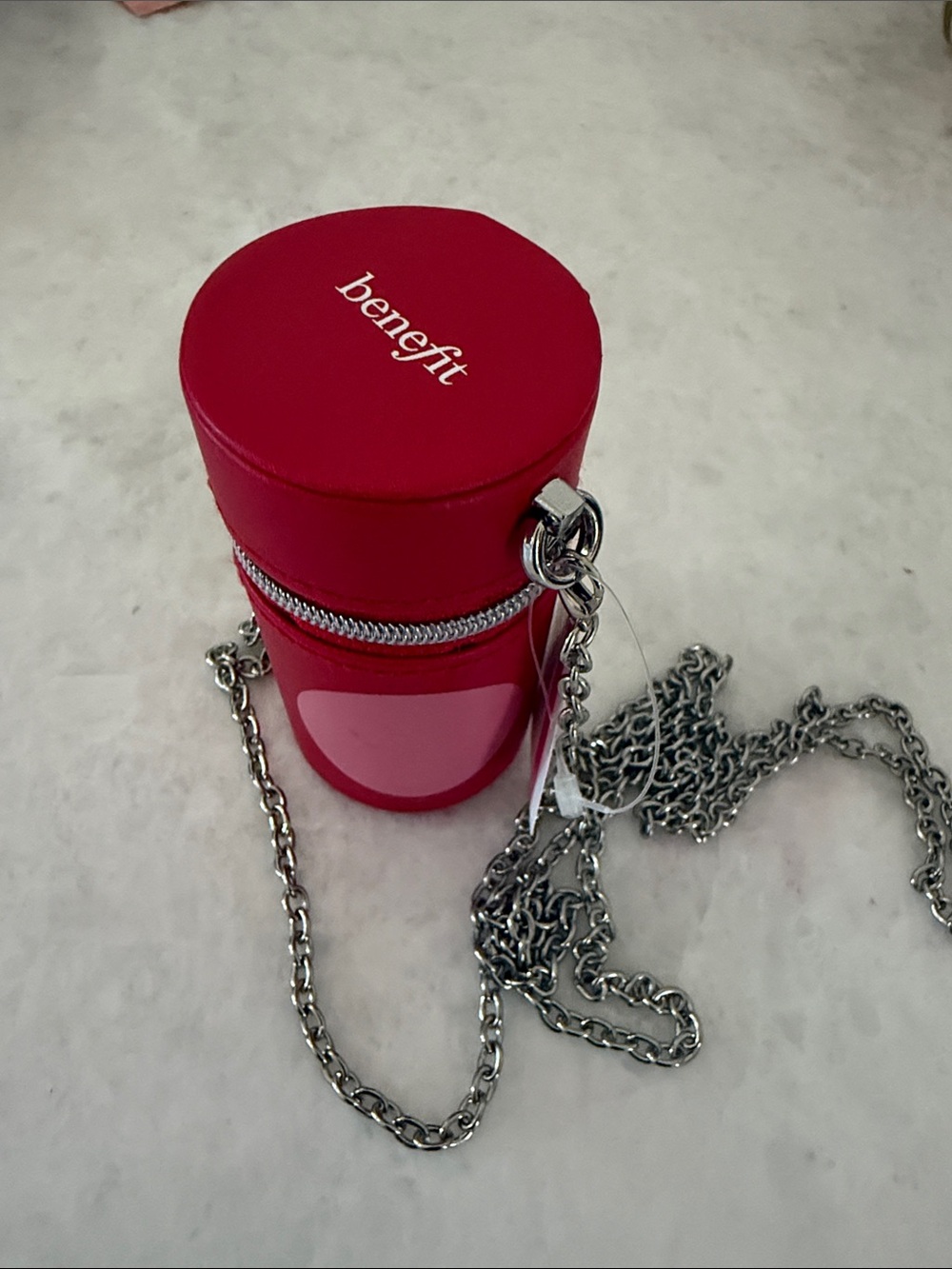 Benefit Pink Cylindrical Crossbody Bag with Silver Chain bag charm